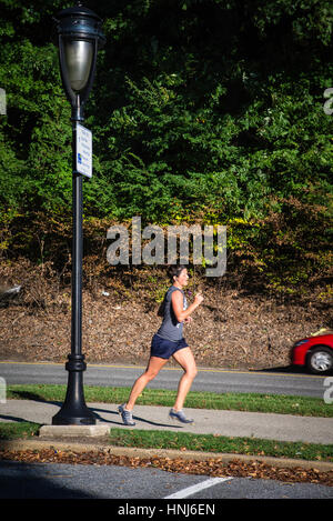 Jogger running in Philadelphia, PA park. Stock Photo