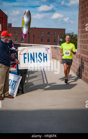 Raising Rase Finish line local Lupus fund raising race Stock Photo - Alamy