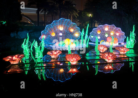 DUBAI, UAE - DEC 6, 2016: Beautiful installations at the Dubai Garden Glow family theme park illuminated at night. United Arab Emirates, Middle East Stock Photo