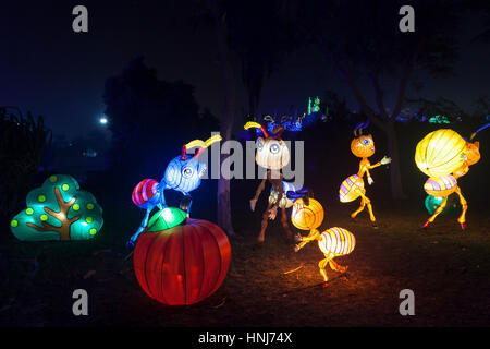 DUBAI, UAE - DEC 6, 2016: Beautiful installations at the Dubai Garden Glow family theme park illuminated at night. United Arab Emirates, Middle East Stock Photo