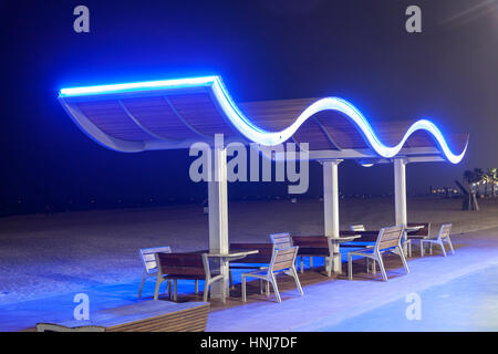 Benches at the Umm Suqeim Beach in Dubai, United Arab Emirates Stock Photo