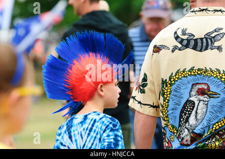 A young boy wears a blue and red iroquois wig on Australia Day 2017, Berrima, New South Wales, Australia Stock Photo