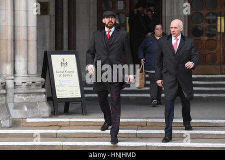 Arran Coghlan (left) outside The Royal Courts of Justice, London, where an inquest into the death of Stephen Akinyemi at Coghlan's home in 2010 is taking place. Stock Photo