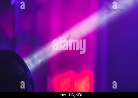 Ray of scenic light over blurred smoke background, modern stage illumination equipment Stock Photo