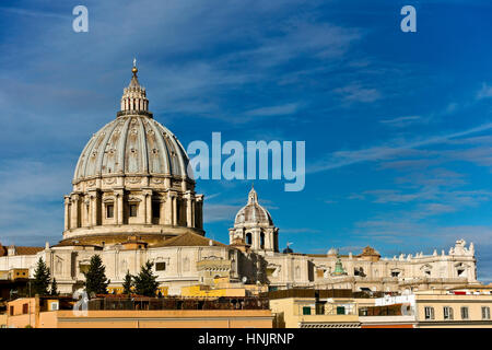 Unusual view of Saint Peter cathedral’s dome seen from the back. Cupola Basilica San Pietro. Rome, Italy, Europe, EU. UNESCO world heritage site. Stock Photo