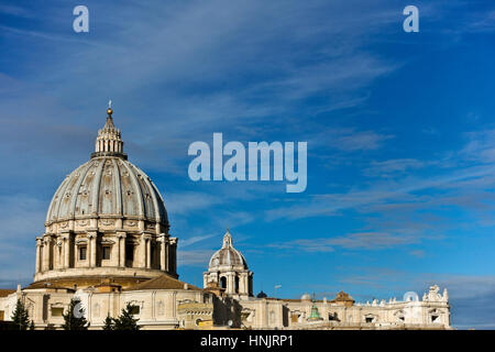 Saint Peter cathedral’s dome seen from the back. Cupola Basilica San Pietro. Rome, Italy, Europe, EU. UNESCO world heritage site. Copy space Stock Photo