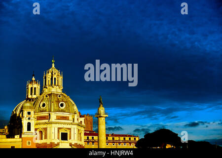 Domes of Churches Holy Mary of Loreto and Most Holy Name of Mary. Santa Maria di Loreto and SS. Nome di Maria. Trajan's Column. At dusk. Rome, Italy Stock Photo