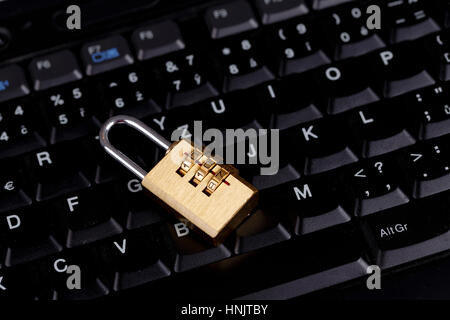 golden lock on black keyboard - computer security concept, internet privacy Stock Photo
