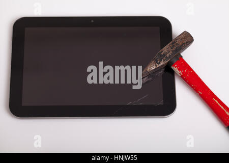 Broken tablet on the table, Selective focus and small depth of field Stock Photo