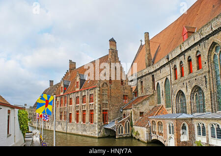 The medieval stepped gables of Saint John’s Hospital, one of the oldest hospital buidings in Europe, located at the Groenerei (Green Canal), Bruges, B Stock Photo