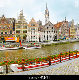 GHENT, BELGIUM - MAY 26, 2011: Graslei Quay of Leie River is the most famous city landmark with many preserved medieval palaces and guild houses, cozy Stock Photo