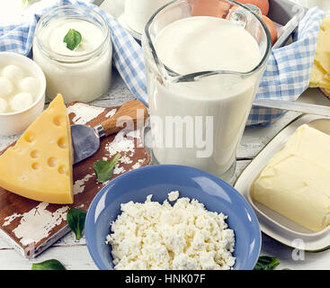 Dairy products on a white wooden table. Stock Photo