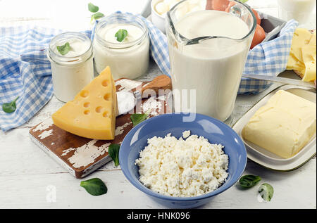 Dairy products on a white wooden table. Stock Photo