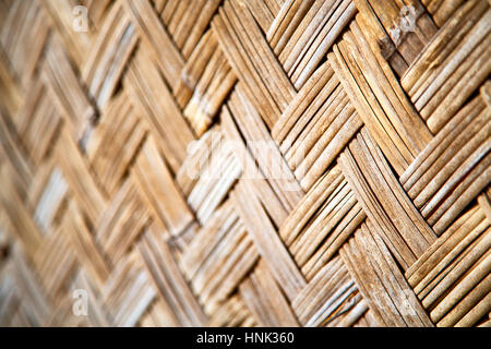 a wall build on wicker bamboo like abstract vintage surface Stock Photo