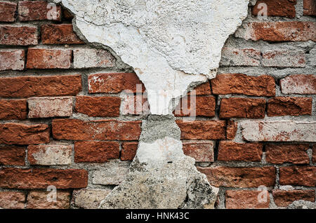 Details of an old ruined brick wall. Stock Photo