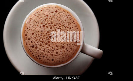 Hot chocolate drink / Hot chocolate, also known as hot cocoa, drinking chocolate or just cocoa is a heated beverage consisting of shaved chocolate Stock Photo