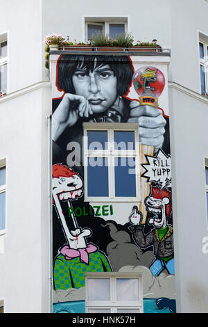 Graffiti on a renovated house, trendy district, Szenekiez SO36, Berlin-Kreuzberg, Berlin, Germany, Europe Stock Photo