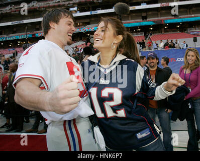 Victoria's Secret model Selita Ebanks chats with the media while wearing a  New England Patriots jersey before the game against the Philadelphia Eagles  at Gillette Stadium in Foxboro, Massachusetts on November 25, 2007. (UPI  Photo/Matthew Healey