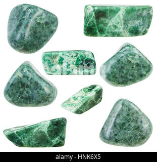 collection of various tumbled green jadeite mineral stones isolated on white background Stock Photo