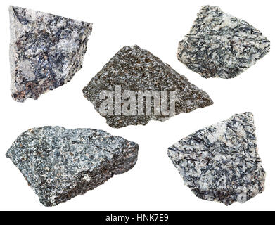 collection of various nepheline syenite mineral stones isolated on white background Stock Photo