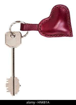 big key with red leather heart shape keychain isolated on white background Stock Photo