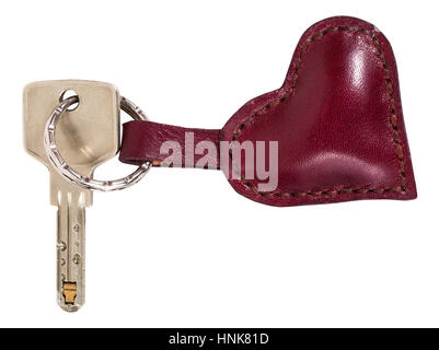 modern key with red leather heart shape keychain isolated on white background Stock Photo