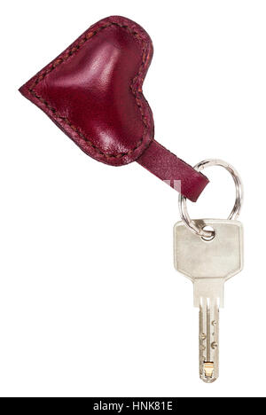 door key with red leather heart shape keychain isolated on white background Stock Photo