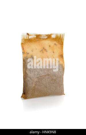 used tea bag isolated on white background Stock Photo