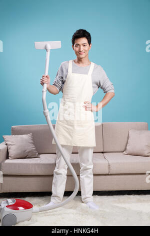 Young men do housework Stock Photo