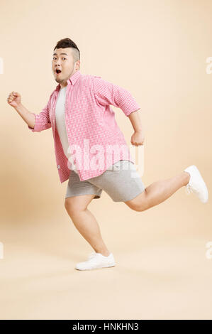 Young fat man travel Stock Photo