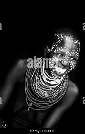 A Portrait Of A Young Woman From The Karo Tribe, Kolcho Village, Omo Valley, Ethiopia Stock Photo