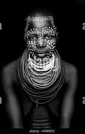 A Portrait Of A Young Woman From The Karo Tribe, Kolcho Village, Omo Valley, Ethiopia Stock Photo