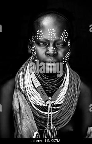 A Portrait Of A Young Woman From The Karo Tribe, Kolcho Village, Omo Valley, Ethiopia Stock Photo