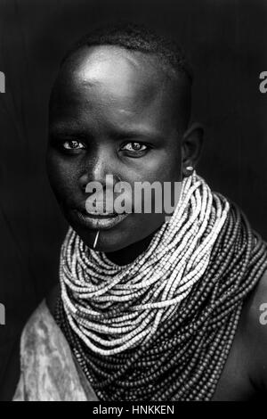 A Portrait Of A Young Woman From The Karo Tribe, Kolcho Village, Omo Valley, Ethiopia Stock Photo