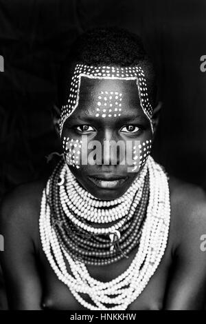 A Portrait Of A Young Woman From The Karo Tribe, Kolcho Village, Omo Valley, Ethiopia Stock Photo