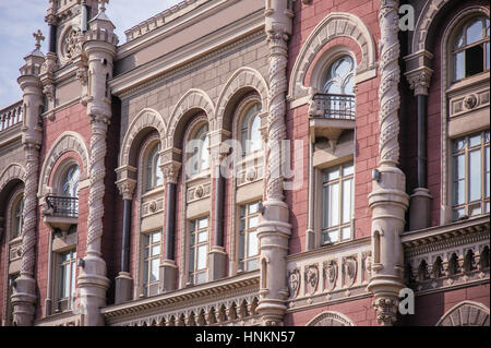 ancient architectural high rise building with windows and pillars Stock Photo