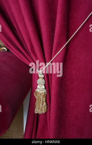 beautiful red curtain with tassel in theater Stock Photo