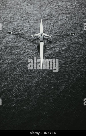 Sculling Rowing Overhead Image A man sculling in a single scull rowing boat, on the water. Overhead ...