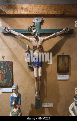 New Mexico, Taos, Martinez Hacienda, family chapel, crucifix Stock Photo