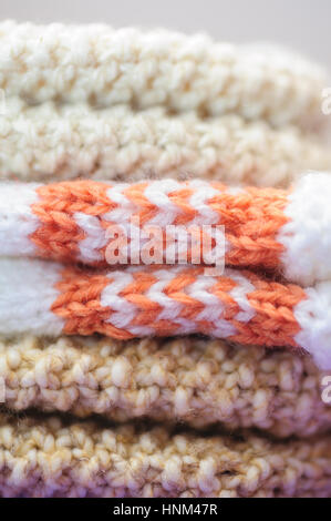 Knitted gloves stacked Stock Photo