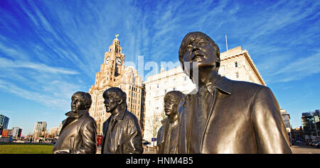 LIVERPOOL UK, 5th JANUARY 2017. Ultra wide angle view of Bronze statue of The Beatles sculpted by Andrew Edwards in place at the Pier Head Liverpool Stock Photo