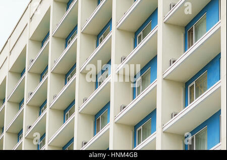 part of a modern multi-storey office building with balconies and windows Stock Photo