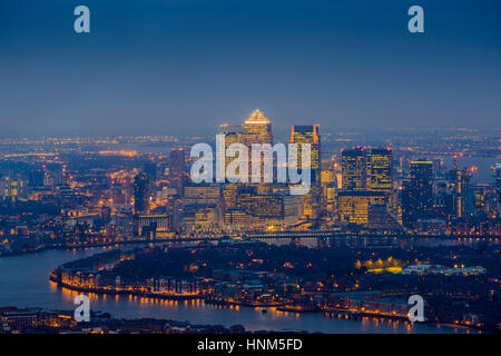London, England - Panoramic skyline view of east London with the skyscrapers of Canary Wharf at blue hour Stock Photo