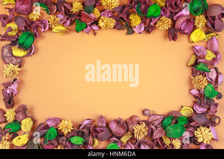Dry flowers composition. Frame made of dried flowers and leaves. Top view, flat lay. Stock Photo