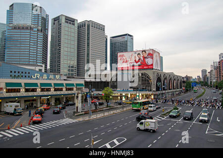 Crowded street at the entrance of the Shinagawa Station in Tokyo, Japan. Stock Photo