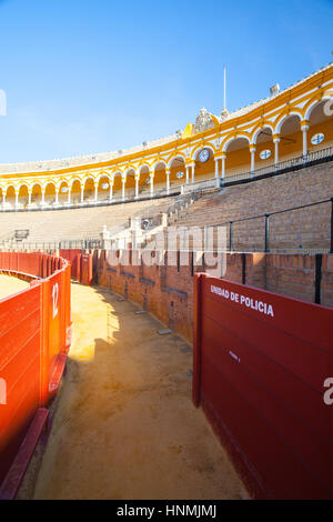 Bullring Of Sevilla. The Yellow Of The Sand And The Red Of The Fence ...