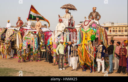 Tourists,folk music,dance Painted,decorated,elephants,At Holi,Spring,colour dye throwing Elephant,Festival,in Jaipur,Rajasthan,India,Indian,Asia. Stock Photo