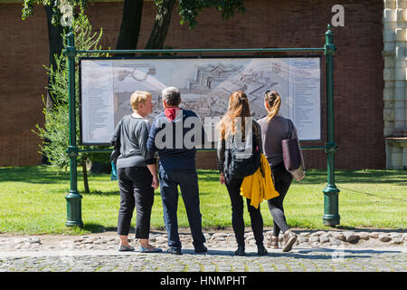 ST. PETERSBURG, RUSSIA - JULY 11, 2016: Tourists crowd around the map of the fortress on the paved area. Stock Photo