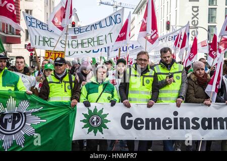 Munich, Bayern, Germany. 14th Feb, 2017. The Ver.di and police unions called for a warning strike today in Munich in a series of strikes in Germany. Included in the strike are workers of the TU and LMU universities, Deutsches Museum, courts, hospitals, Bayerische Staatsoper, Bayerisches Schauspiel, and others including highway workers. Police are demanding a raise of 6% and modifications to the training structures. The third round of discussions for the police union are this week (16th and 17th). 1,100 strikers were at the beginning of the march, then joined by some 400 more at Geschwi Stock Photo