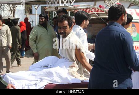 Injured of road accident being shifting to Jinnah Hospital for treatment in Karachi on Tuesday, February 14, 2017. A bus overturned on Tuesday morning near Sassi Toll Plaza in which six people died while 20 others were injured. Stock Photo